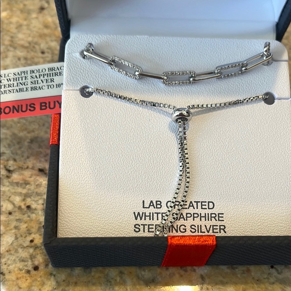 Sophisticated Silver and White Bracelet with Intricate Design